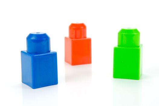 Toy building blocks isolated against a white background