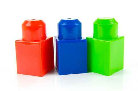 Toy building blocks isolated against a white background