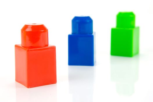 Toy building blocks isolated against a white background