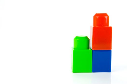 Toy building blocks isolated against a white background