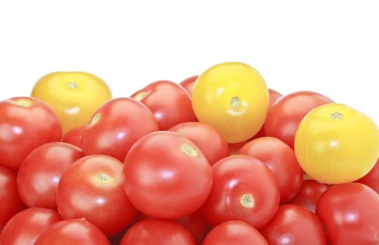 Fresh ripe red and yellow cocktail tomatoes isolated on white