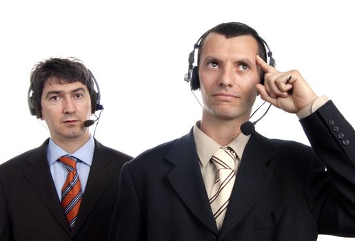 two young call center men talking by the phone