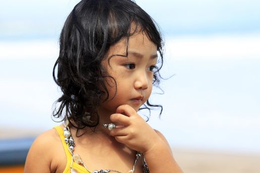 Portrait of the beautiful small Asian girl.  Indonesia. Java