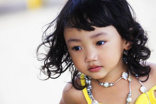 Portrait of the beautiful small Asian girl.  Indonesia. Java