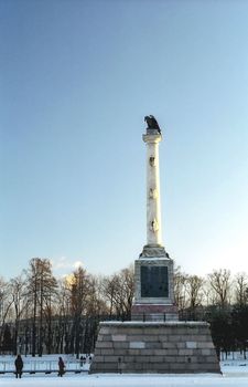Column and eagle with day moon 