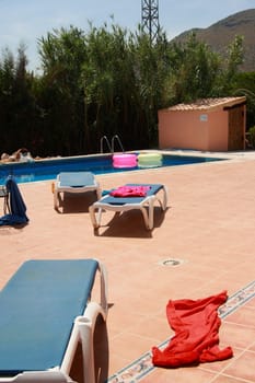 by the pool