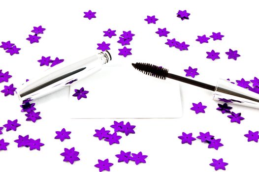 cosmetics with violet stars on white bacground