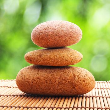 spa still life with zen stone and green leaf