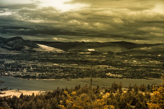 dramatic photo of a landscape with lake view and mountains
