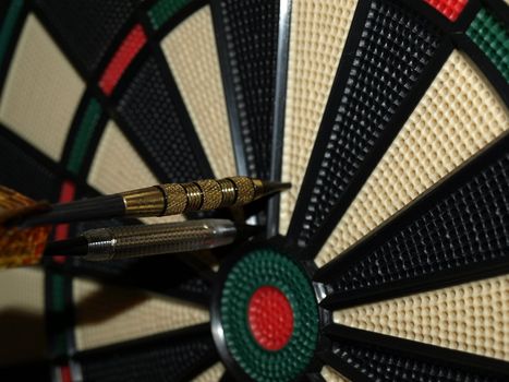 A pair of darts just off the center