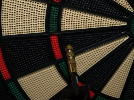 Dart thrown at a board but off center