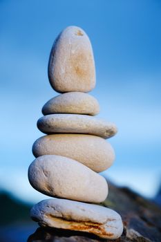 Pile of the stones against the blue sky