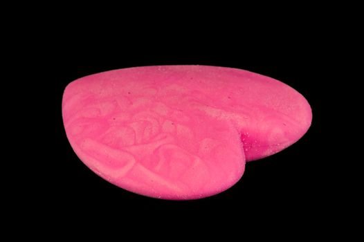 Nice pink eraser isolated on black