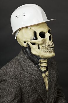 The deadly construction superintendent in a white protective helmet