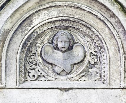 An image of a nice stone angel face