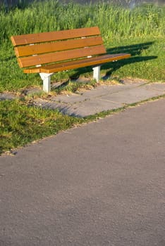 A bench a sunny summer morning