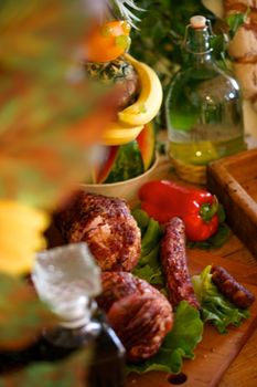 farmhouse table with traditional Polish delicacies. Ham, sausage, bread, etc.