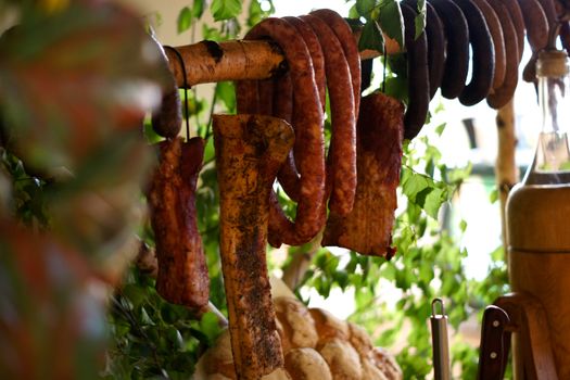 farmhouse table with traditional Polish delicacies. Ham, sausage, bread, etc.