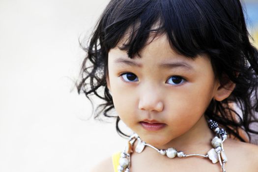 Portrait of the beautiful small Asian girl. Indonesia. Java