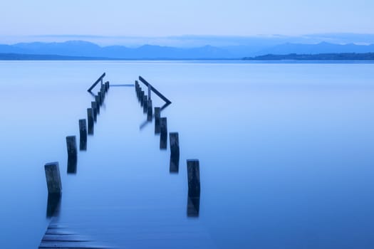 An image of an old wood walk at Starnberg lake