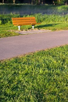 A bench a sunny summer morning