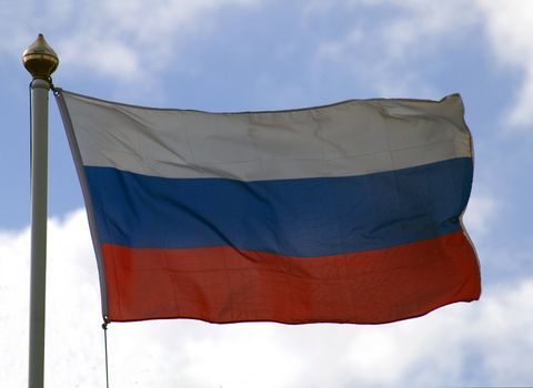 Russian Flag flying on a flagpole