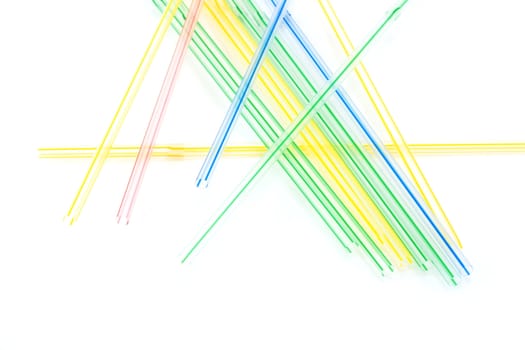 Plastic straws for cocktail on white background