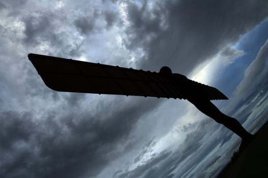 silhouette of angel of the north statue