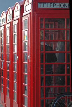 A row of iconic British Telephone Boxes