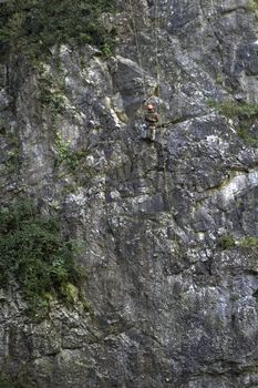 A Rock climber on a cliff face