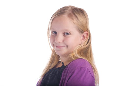 Smiling girl wearing a purple sweater