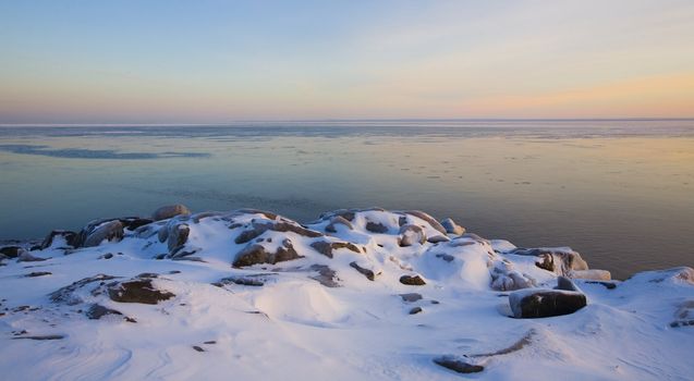 December image of lake Superior at sunset from Brighton Beach in Duluth, Minnesota