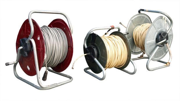 Three reels  of coaxial TV cable isolated with clipping path   