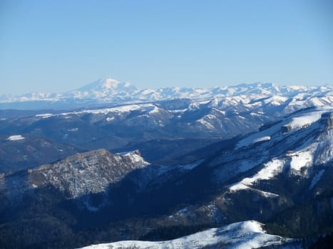 The main Caucasian ridge; rocks; a relief; a landscape; a hill; a panorama