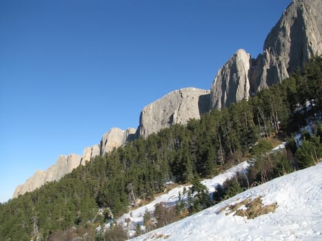 Ridge; rocks; a relief; a landscape; a hill; a panorama; mountains
