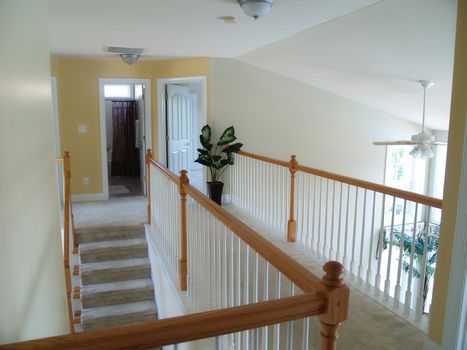 View from an interior balcony of the landing overlooking the family room     