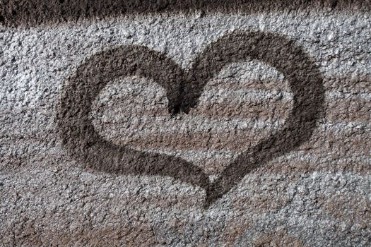 Dark Graffiti heart on house wall