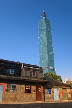 Taipei 101 was a famous landmark in world. In front of this skyscraper was an old community. Another renewal scenery in morden city.