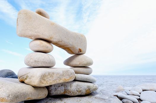Some small pebbles are connected with a large stone