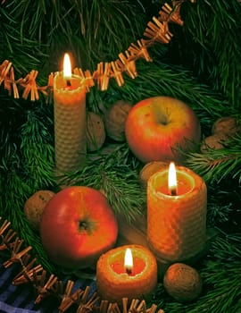 christmas still life with a candles and apples 