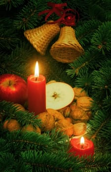 christmas still life with bells and candles