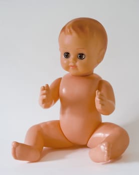 vintage plastic toy doll isolated in white