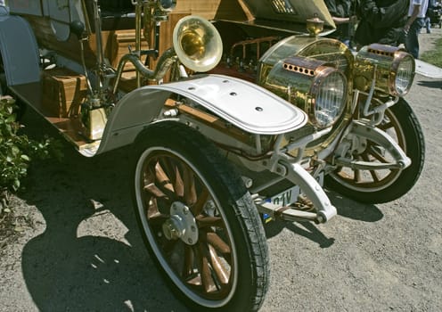 front of an old timer car