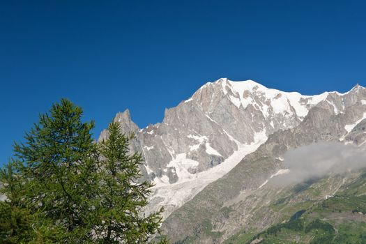 summer view Mont Blanc from Ferret valley, Courmayeur, Italy.