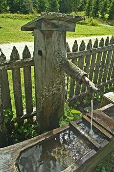 alpen wooden manger with fountain