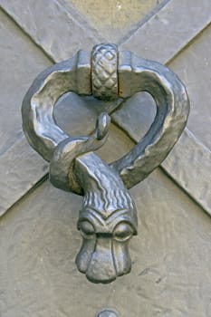 medieval metal knocker at church door