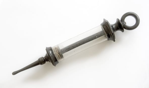 vintage syringe isolated on white