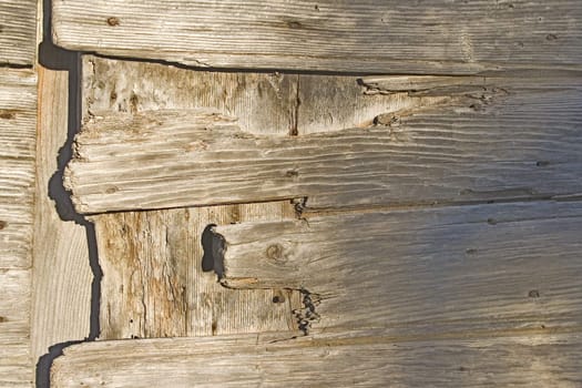 close up of an old destroyed wooden door