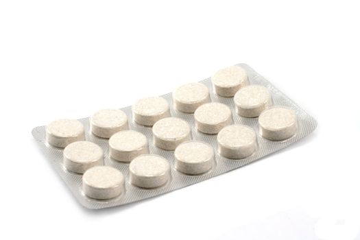 Packing the tablets, insulated on white background