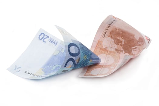 Bills euro rolled up insulated on white background